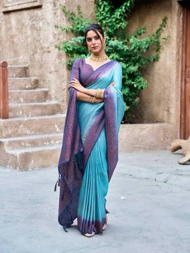 Pure silk saree in rich jewel tones at Riti Riwaz ethnic wear store Patna